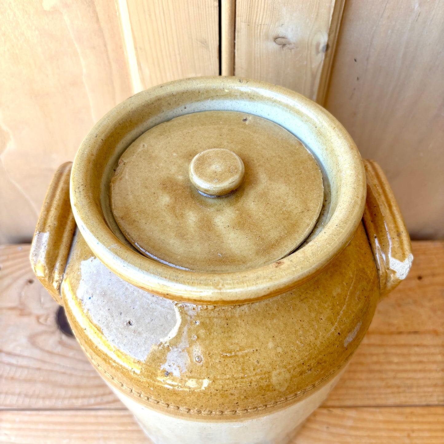 Vintage Stoneware Jar with handles and original lid.