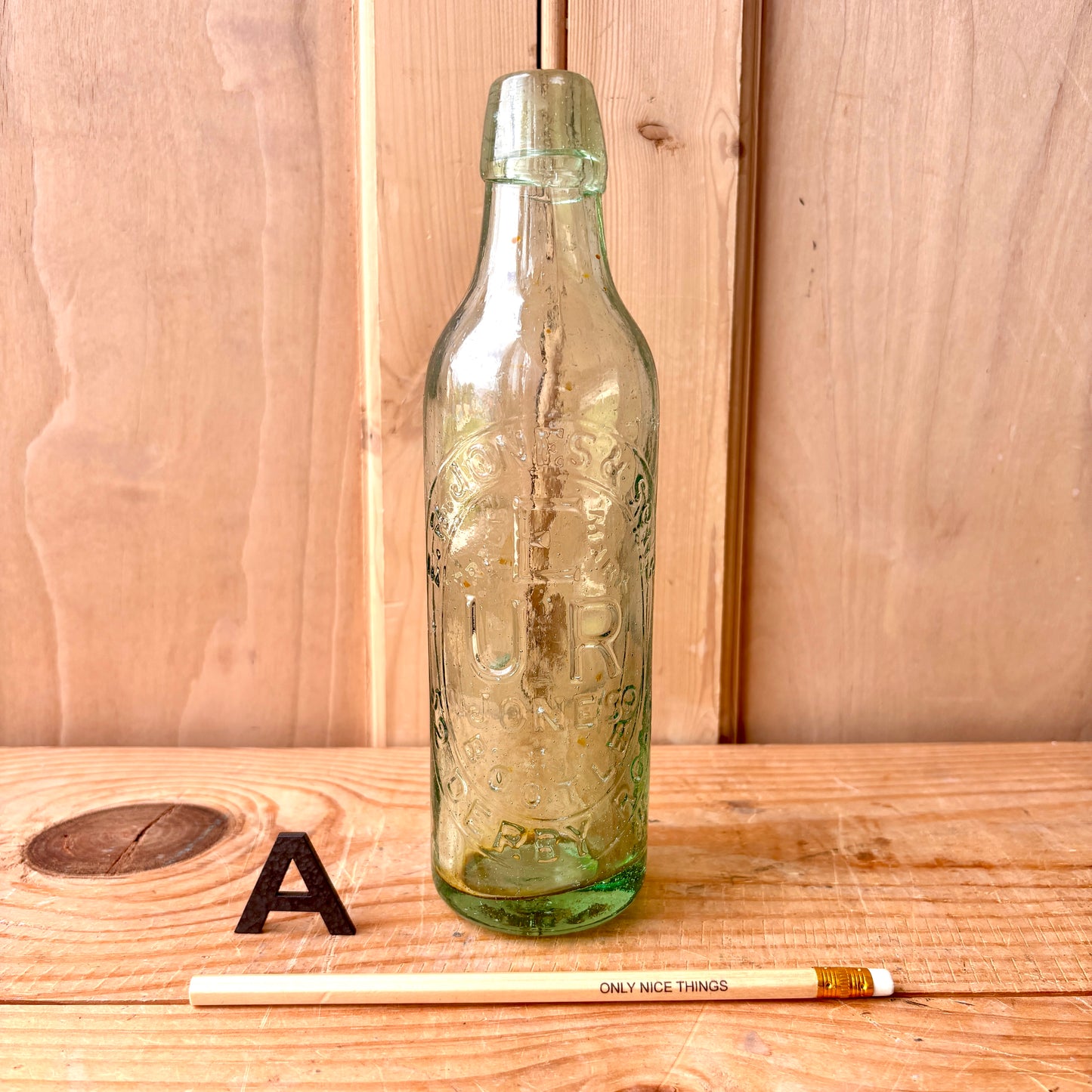 Vintage Stamped Glass Bottles