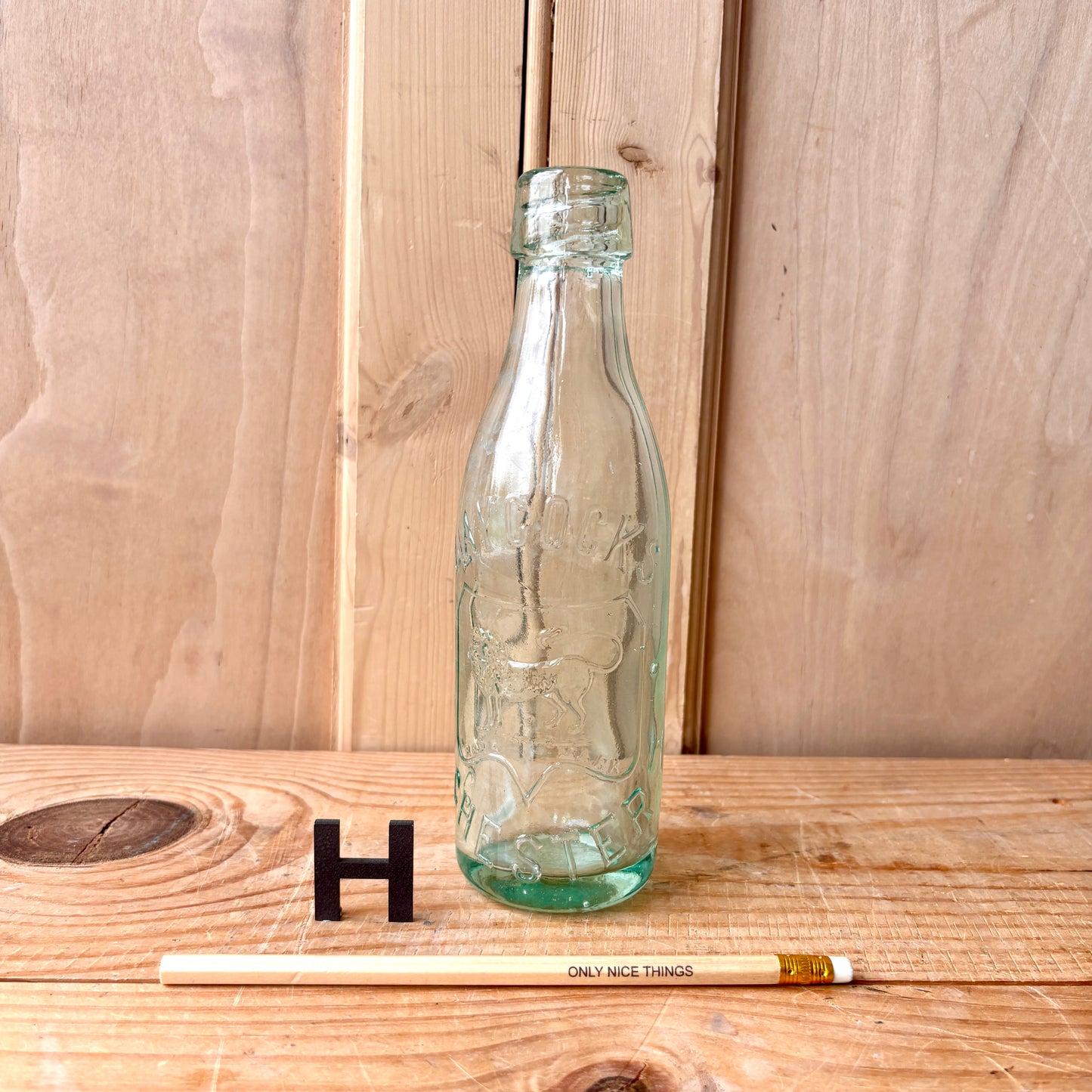 Vintage Stamped Glass Bottles
