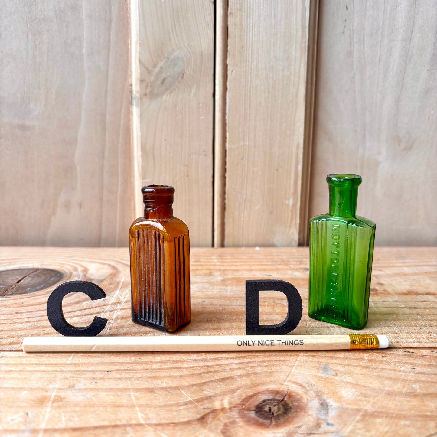 Tiny vintage chemist and poison bottles