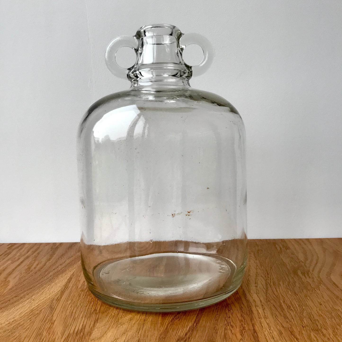 Vintage glass demijohn