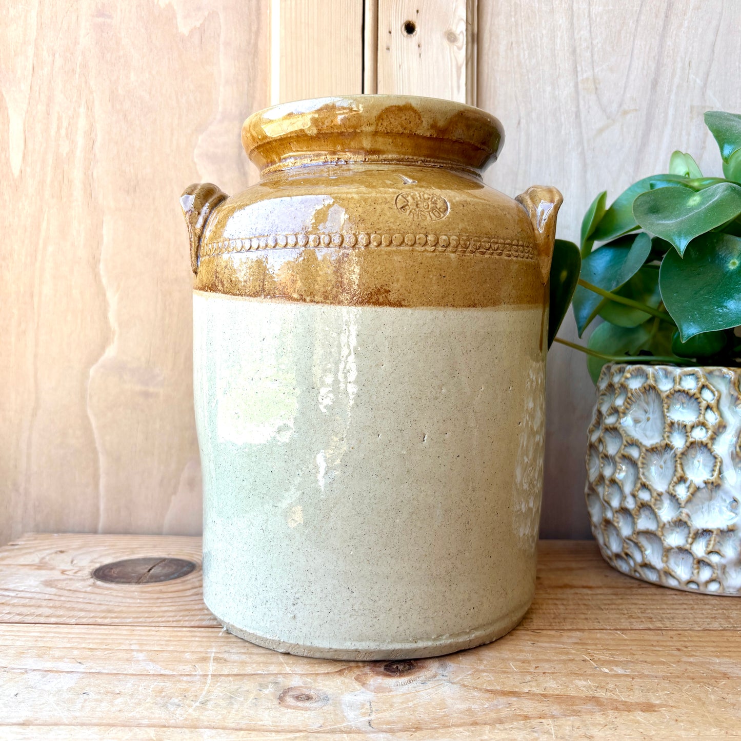 Vintage Stoneware Jar with handles and original lid.