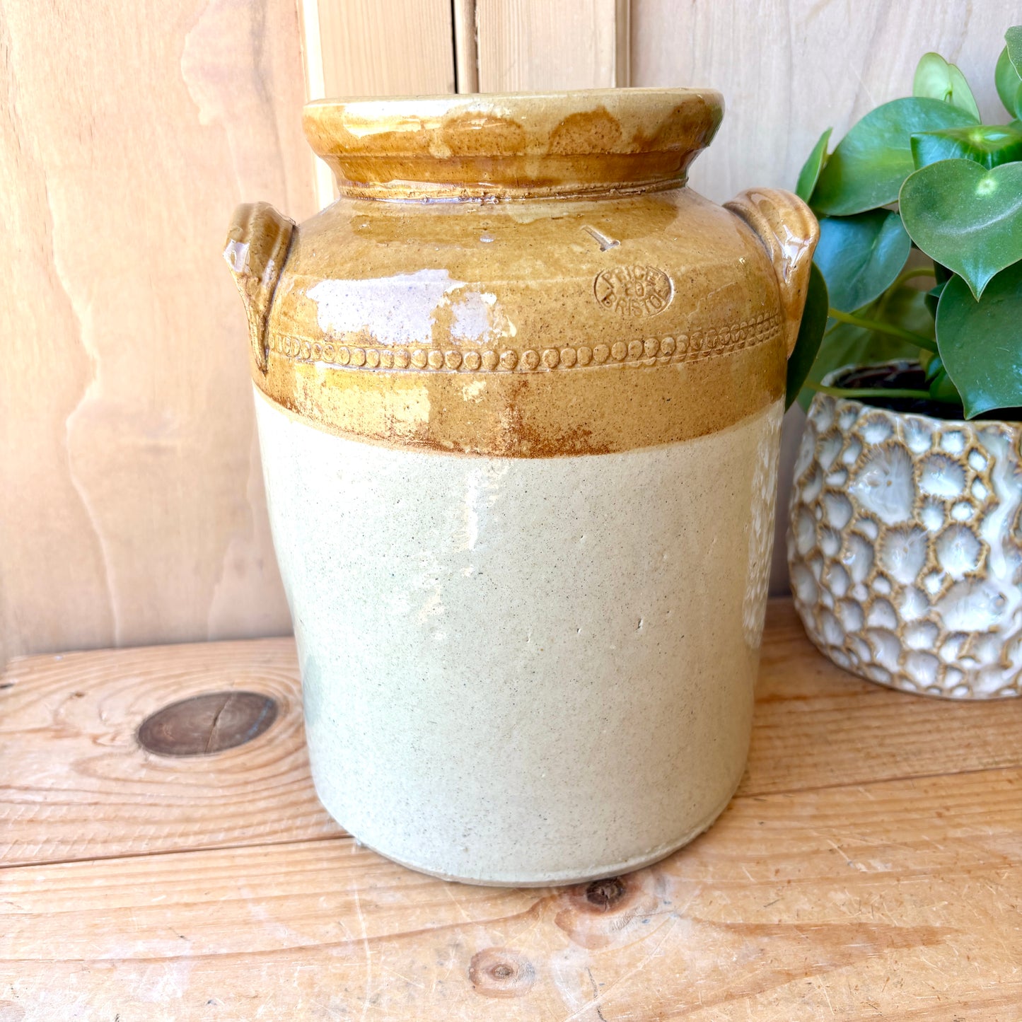 Vintage Stoneware Jar with handles and original lid.