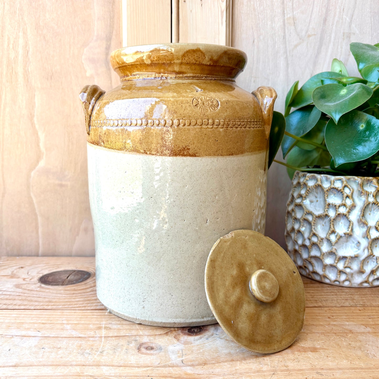 Vintage Stoneware Jar with handles and original lid.