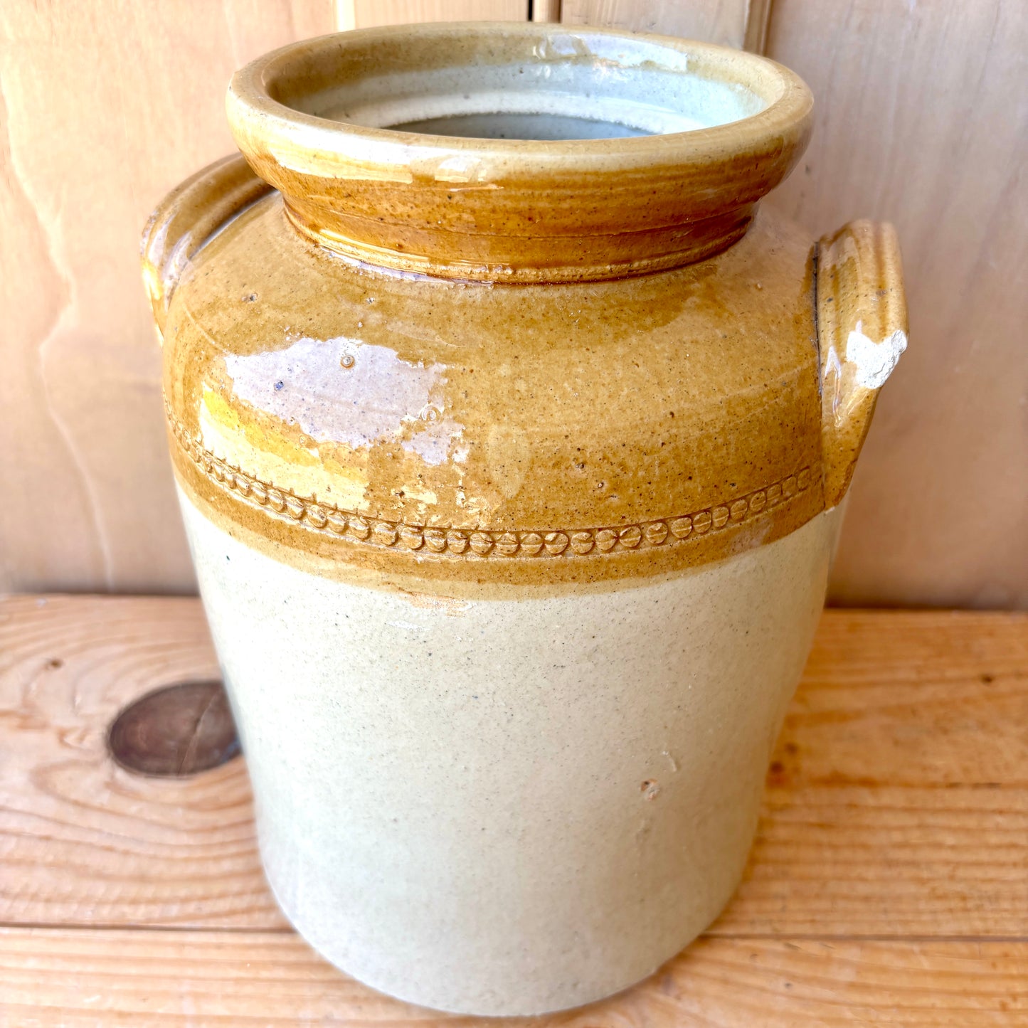 Vintage Stoneware Jar with handles and original lid.