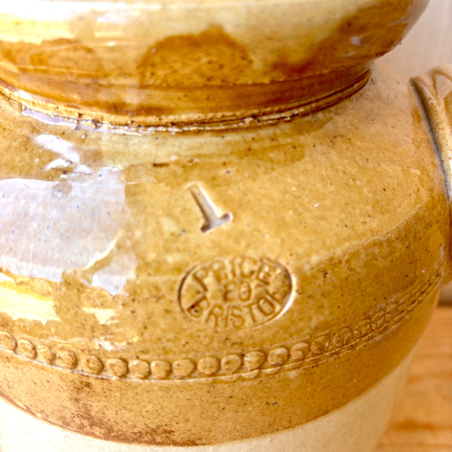 Vintage Stoneware Jar with handles and original lid.