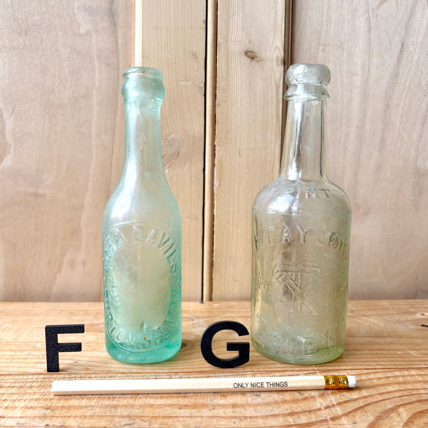 Vintage Stamped Glass Bottles
