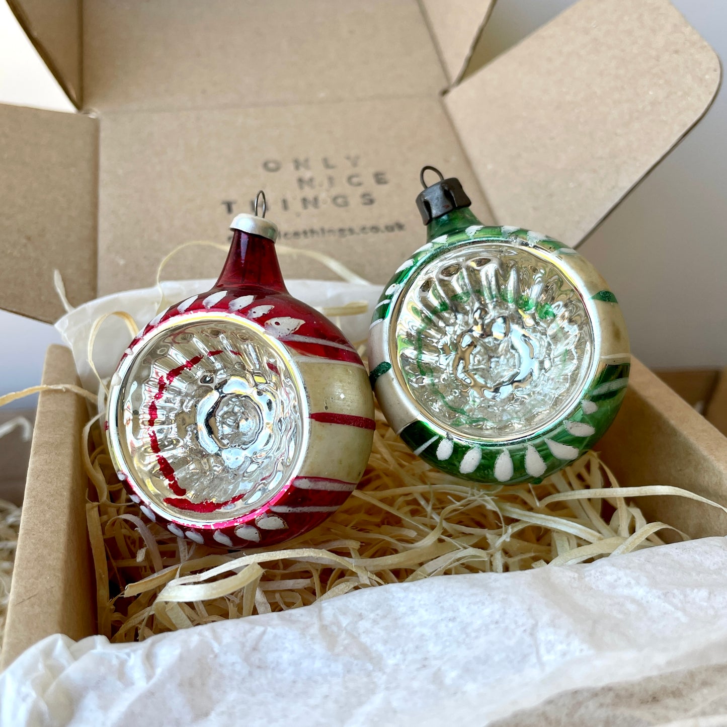 Two vintage concaved baubles