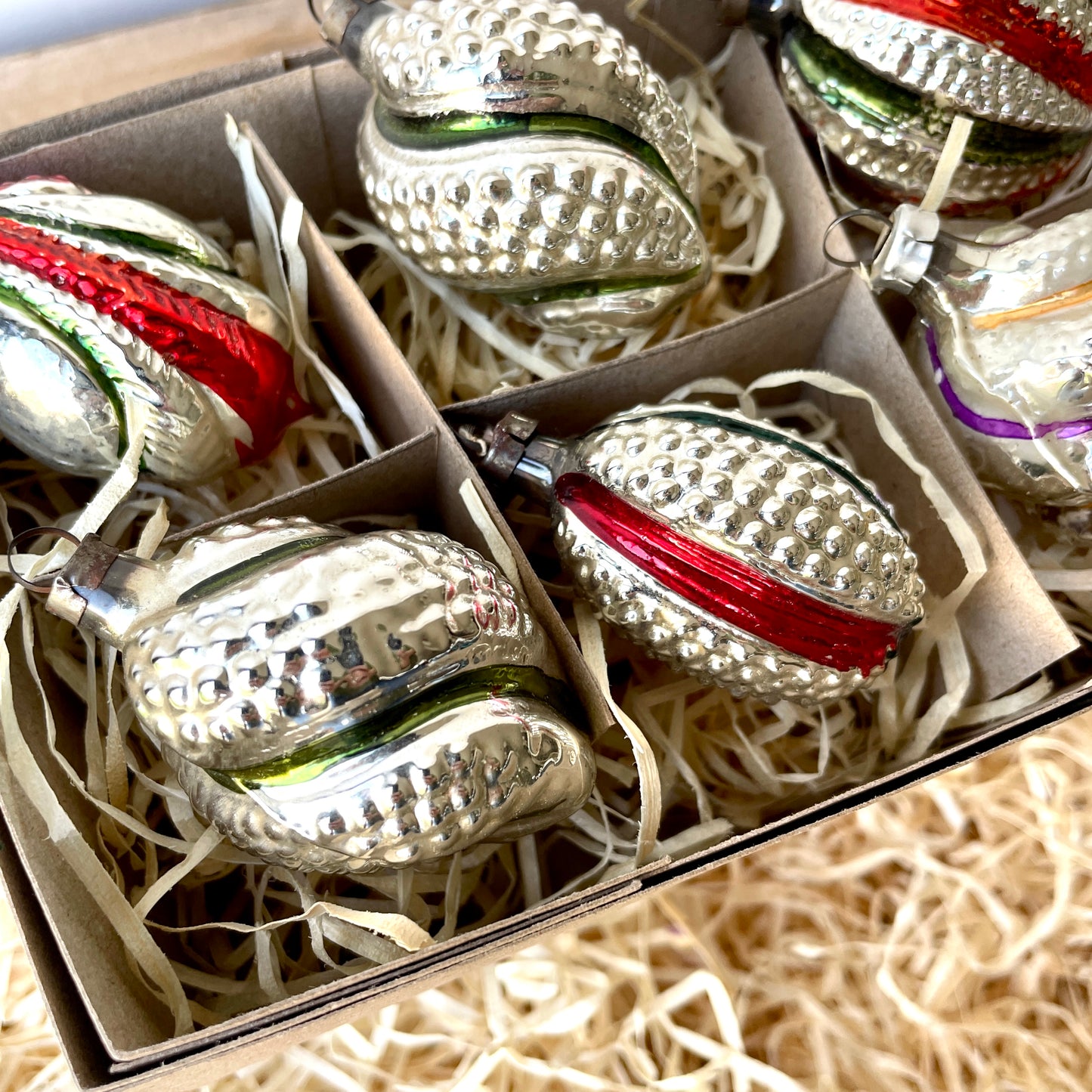 Six vintage twist and stipple shaped glass baubles