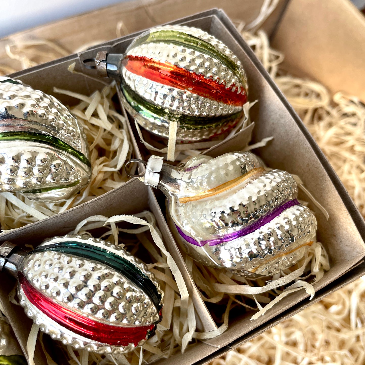 Six vintage twist and stipple shaped glass baubles