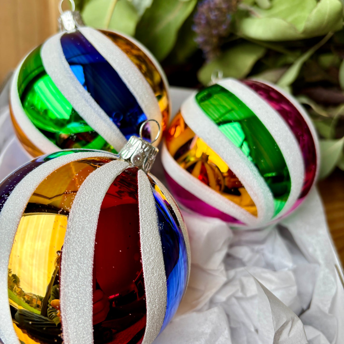 Three candy stripe baubles