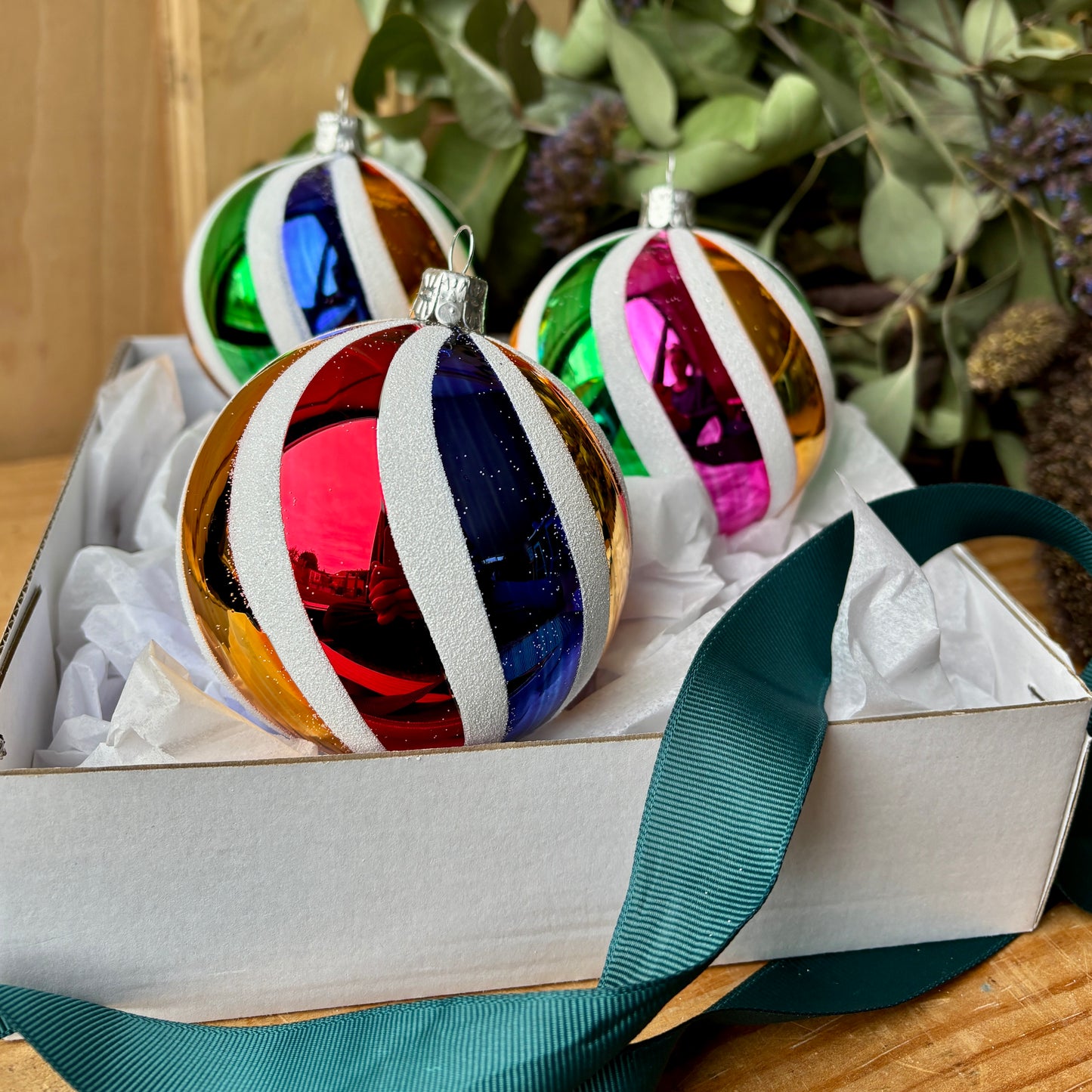 Three candy stripe baubles