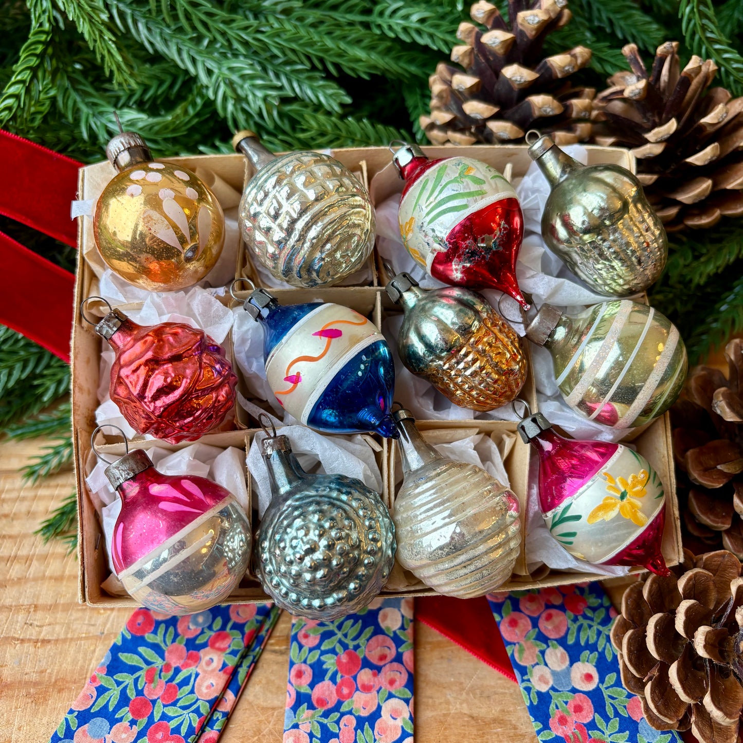 Twelve small mixed baubles