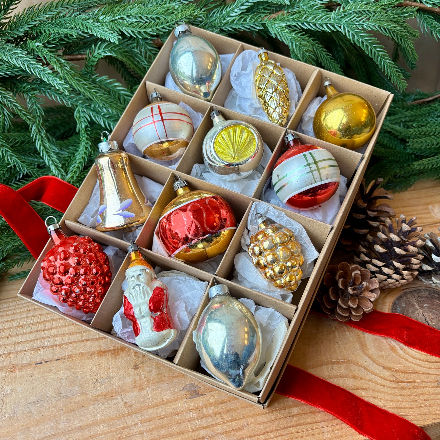 Twelve red gold and silver vintage baubles
