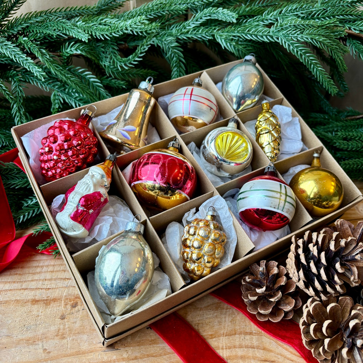 Twelve red gold and silver vintage baubles