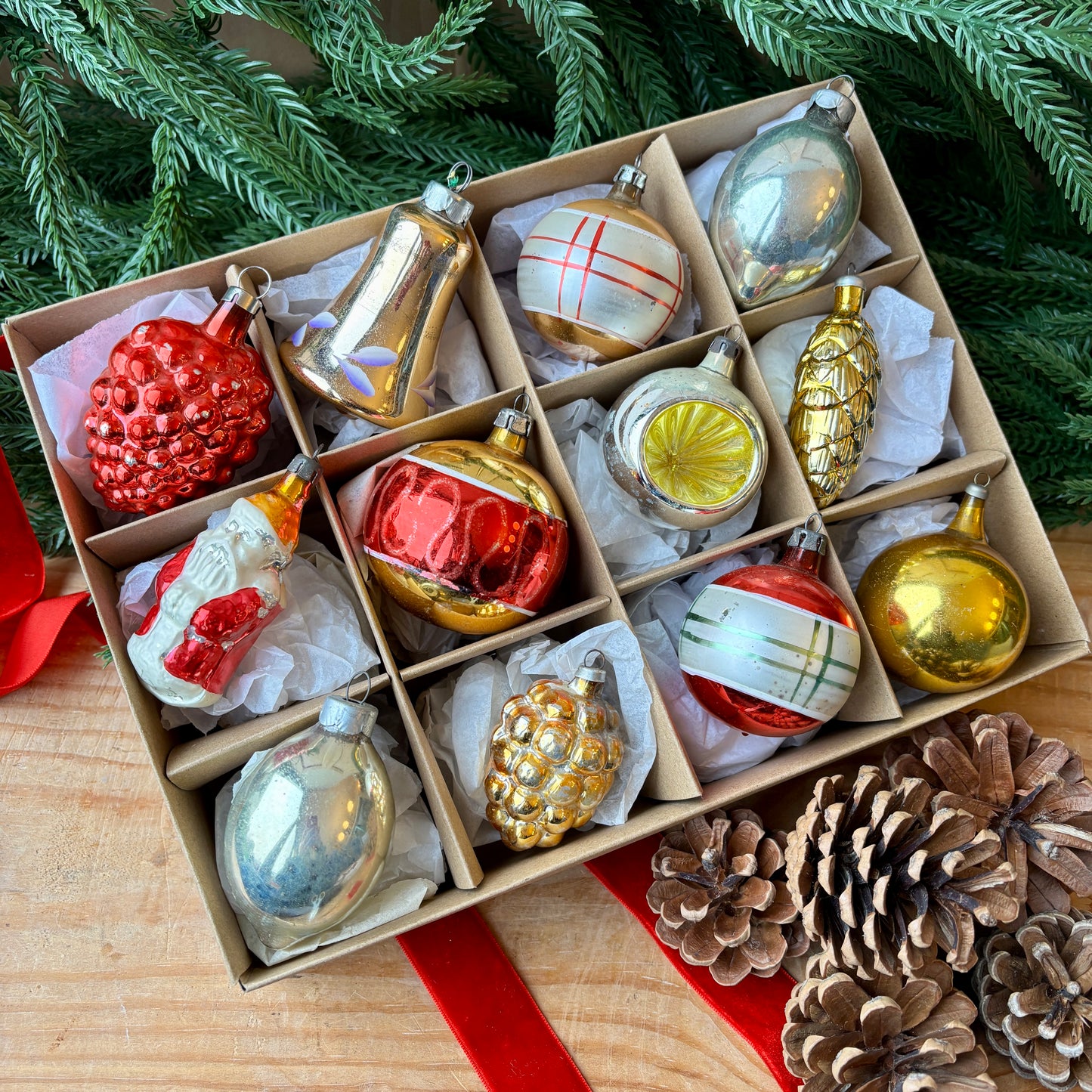 Twelve red gold and silver vintage baubles