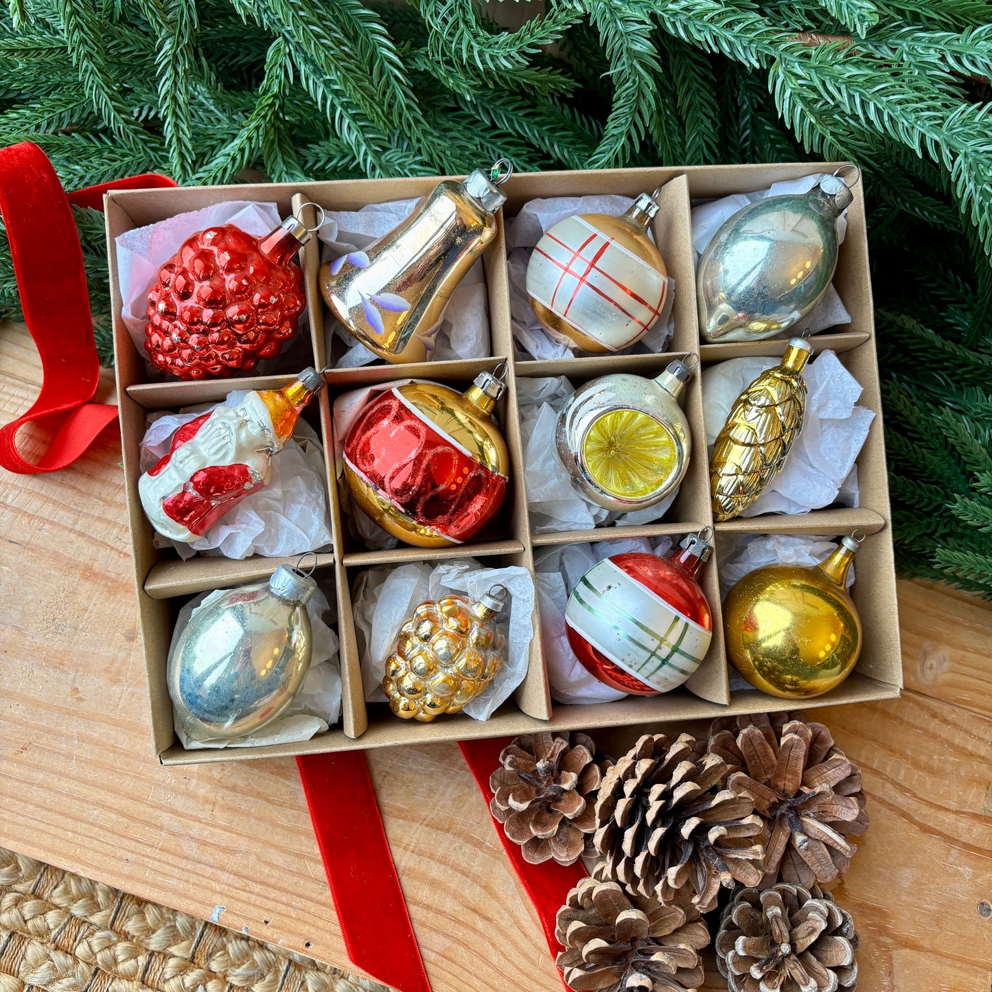 Twelve red gold and silver vintage baubles