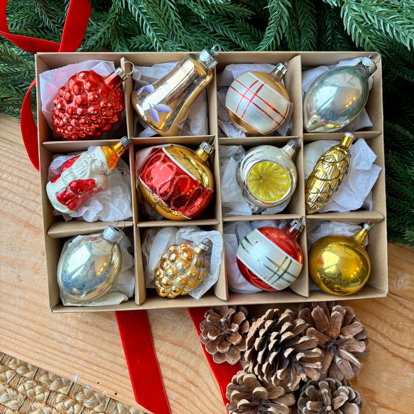 Twelve red gold and silver vintage baubles