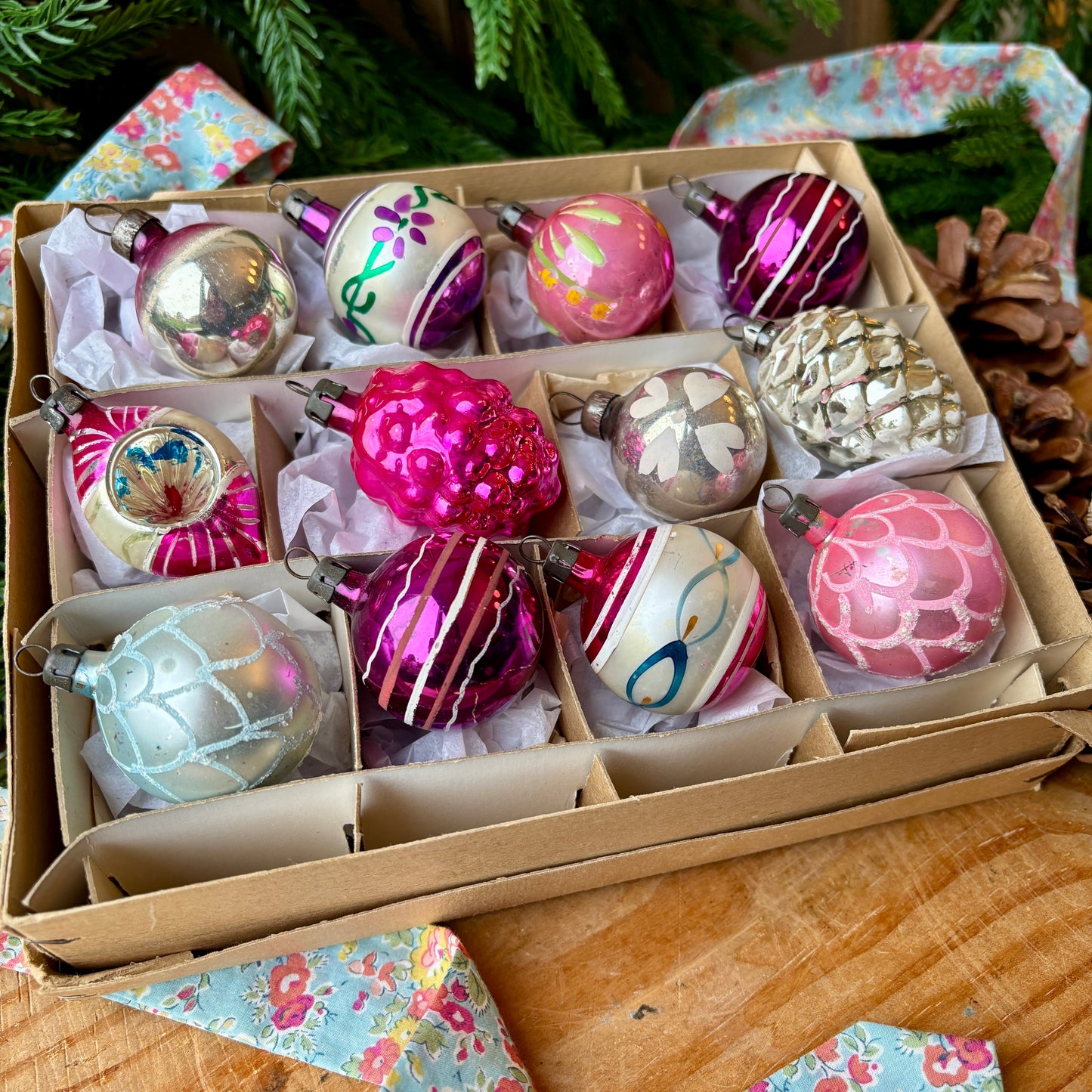 Twelve pink and purple mixed vintage baubles