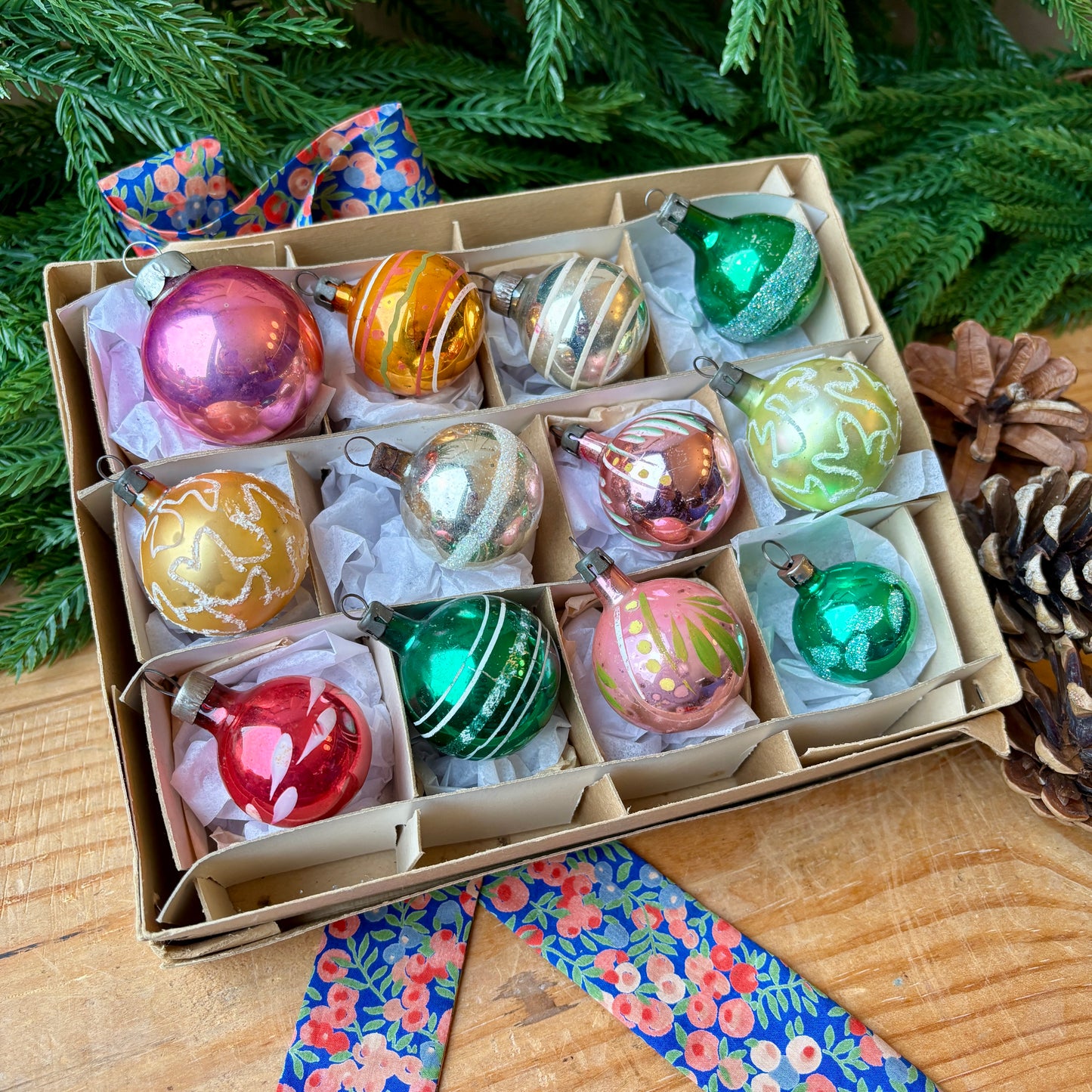Twelve small mixed baubles