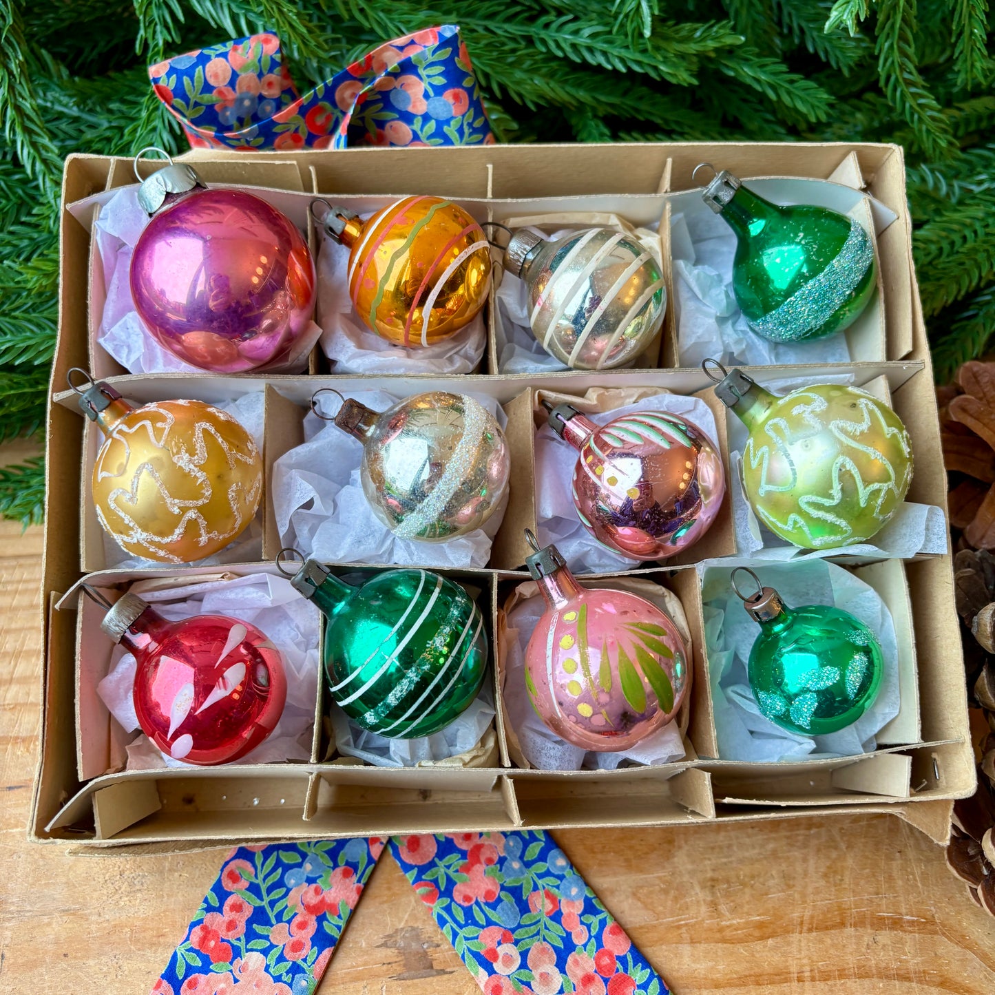 Twelve small mixed baubles