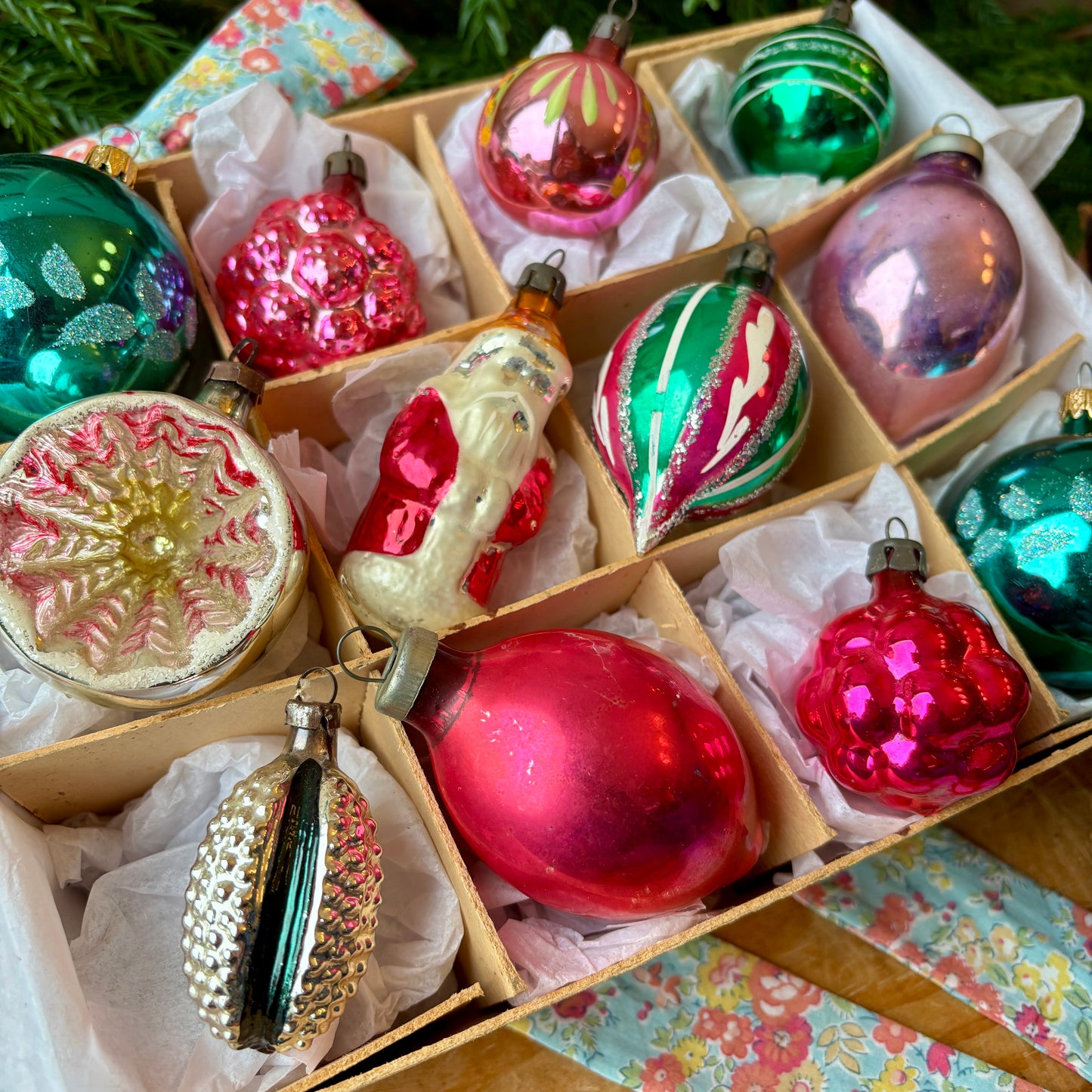 Twelve pink and green vintage glass baubles