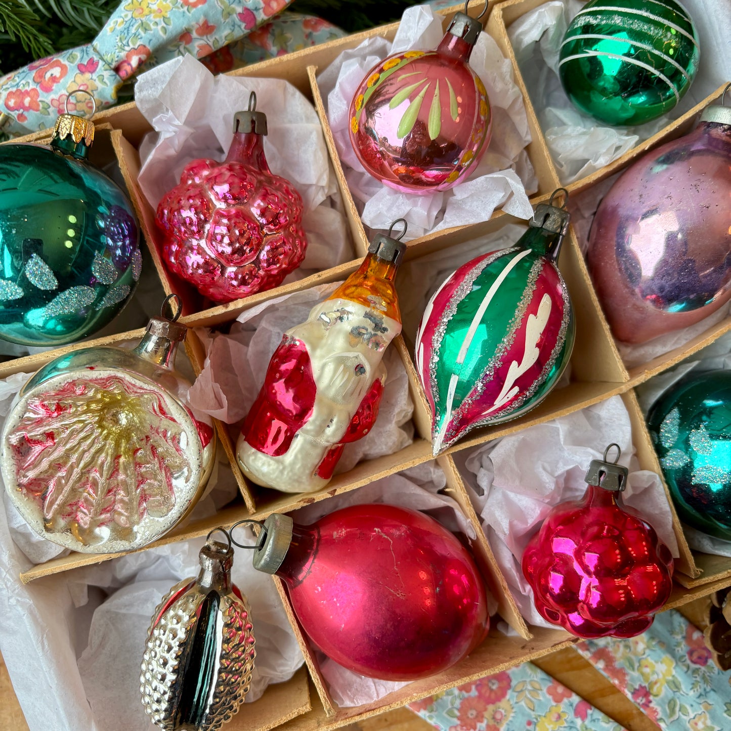 Twelve pink and green vintage glass baubles