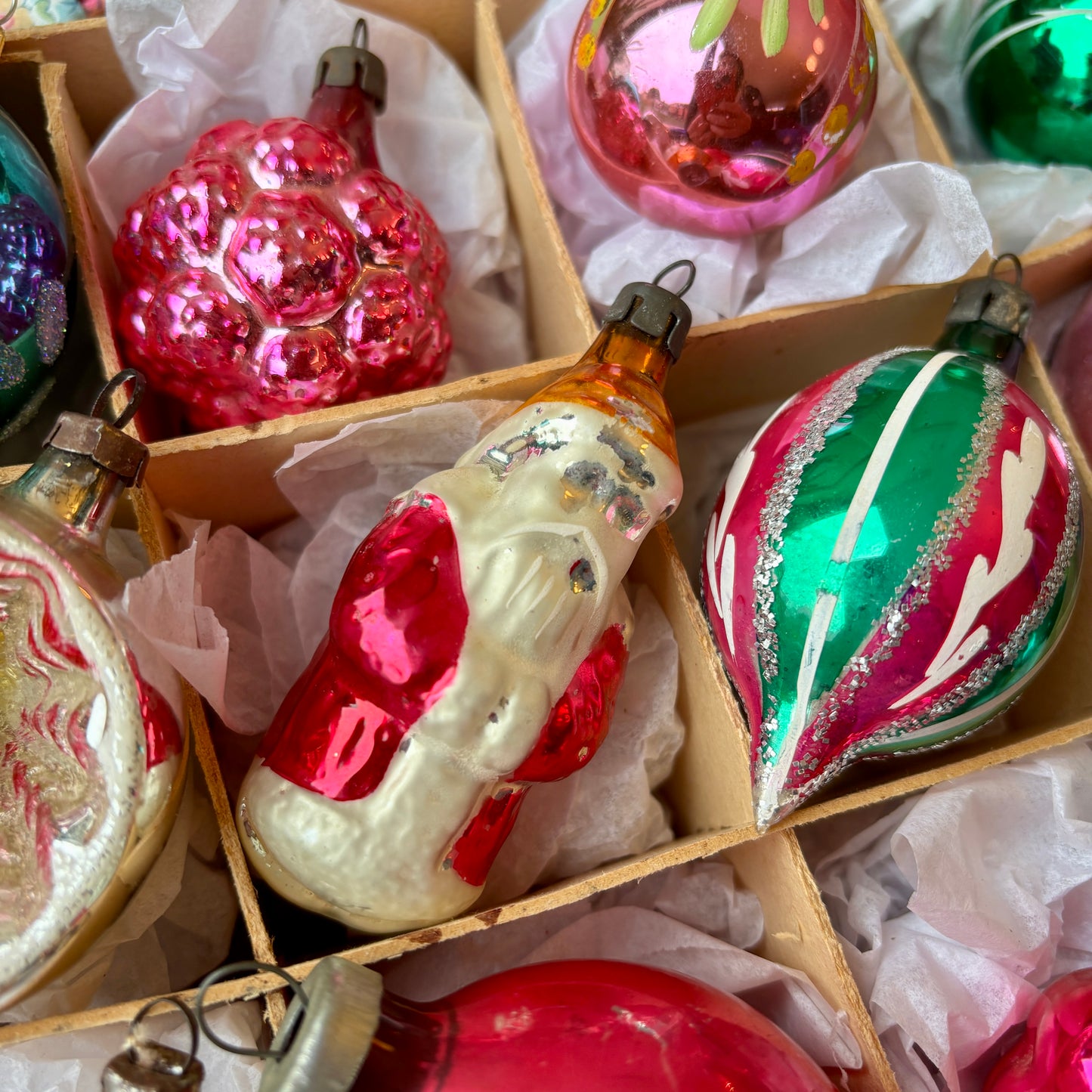 Twelve pink and green vintage glass baubles