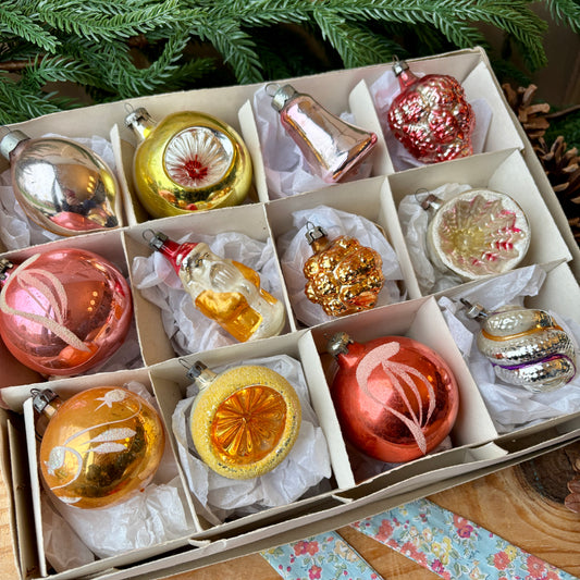 Twelve mixed pastel vintage baubles