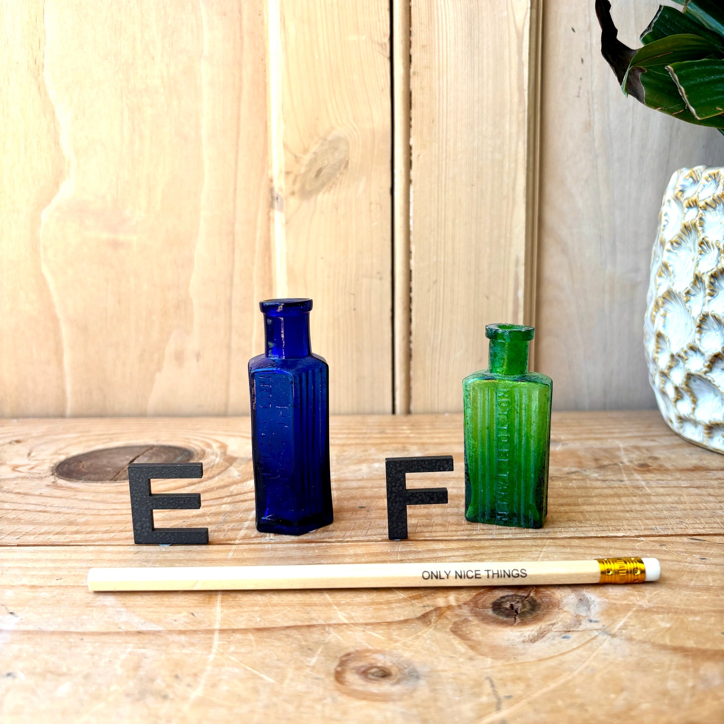 Tiny vintage chemist and poison bottles