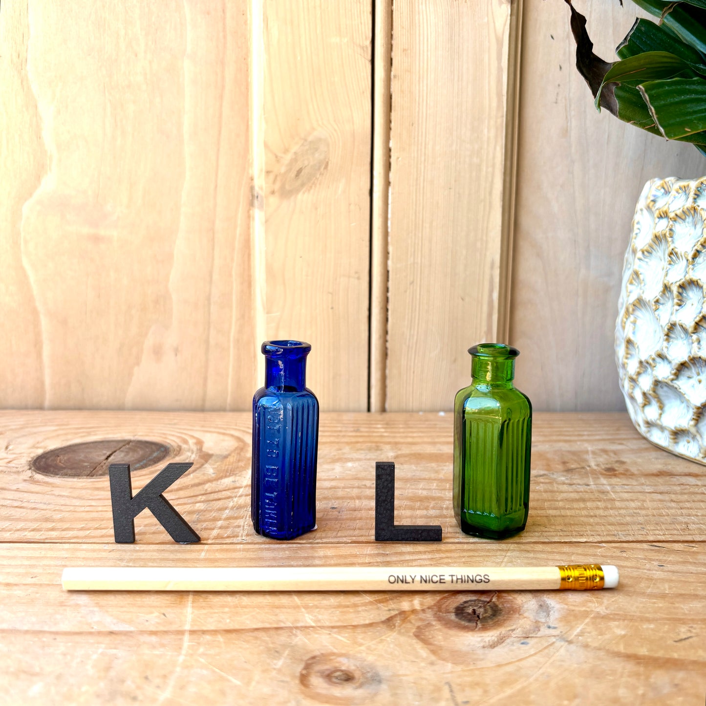 Tiny vintage chemist and poison bottles