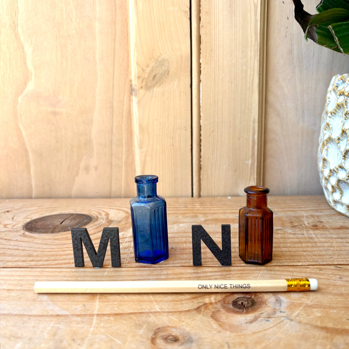 Tiny vintage chemist and poison bottles