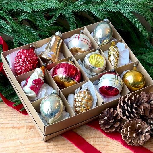 Twelve red gold and silver vintage baubles