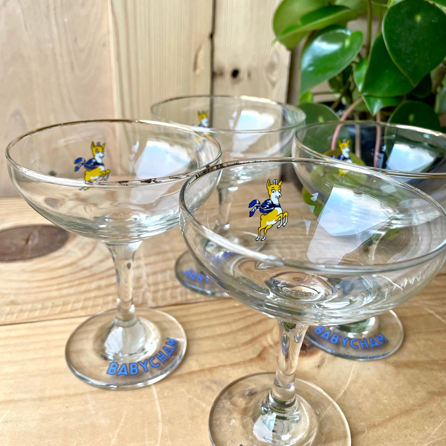 Four 1970s Babycham glasses