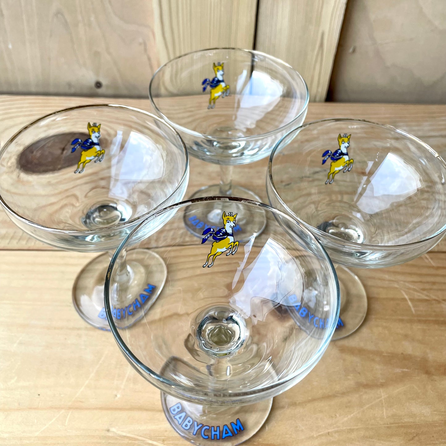 Four 1970s Babycham glasses