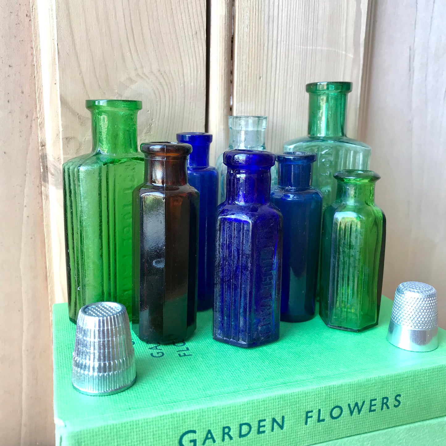 Tiny vintage chemist and poison bottles